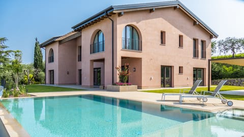 Outdoor pool, an infinity pool, sun loungers