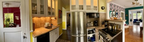 Panorama of mud room to living room