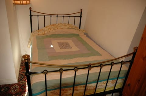 Cast iron Bed.