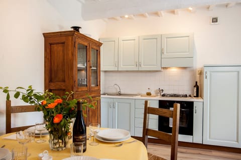 Table for 4 and kitchen