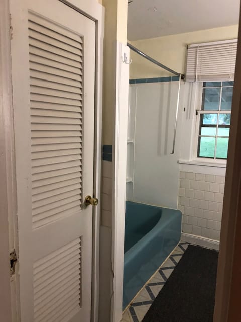 Combined shower/tub, hair dryer, towels, soap