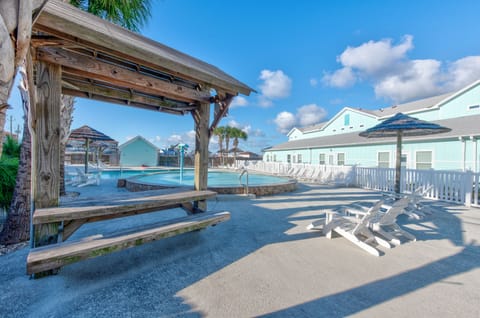 A heated pool, sun loungers