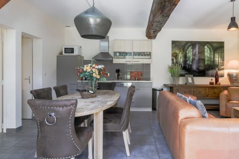 Open space kitchen, dining and salon area