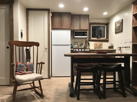 Bathroom door, closet, fridge, stove/oven, sink, dining table. Enjoy!