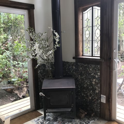 Wood stove to cozy up to, firewood provided. (There is also heat in the cabin.) 