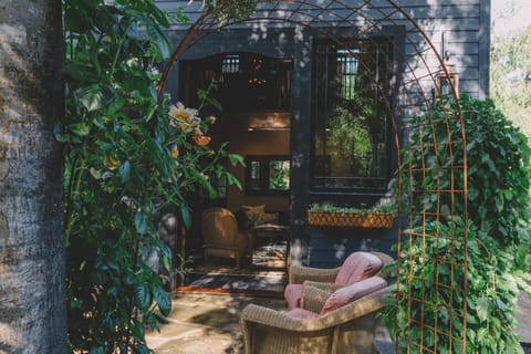 Indoor & Outdoor living. Surrounded by lush gardens.