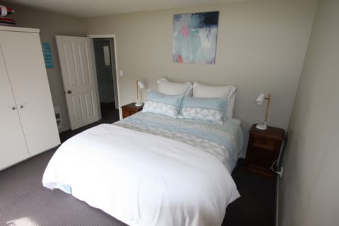 Master Bedroom - King Size Bed and opening doors onto deck area