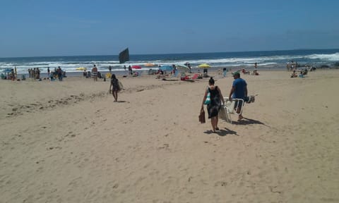 On the beach, sun loungers