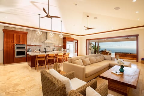Enjoy resort-style living with disappearing pocket doors, soaring ceilings, and ocean breezes throughout.