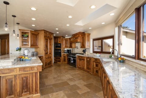 The kitchen offers high end appliances and everything you need to cook and dine