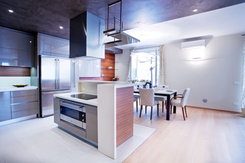 Rustle up a feast in the bespoke designer kitchen including corian worktops