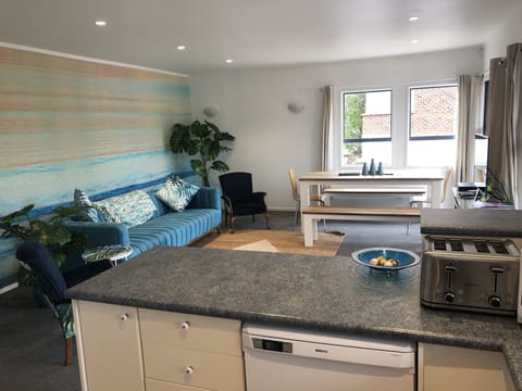 Open plan kitchen with dishwasher, toaster & Nespresso coffee machine (capsules 