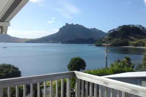 View across Urquharts Bay to Mt Manaia.