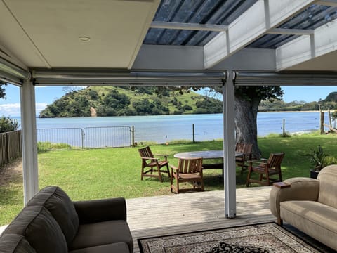 waterfront relaxation on the covered deck