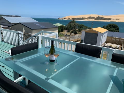 Outside table on deck overlooking part of the view.