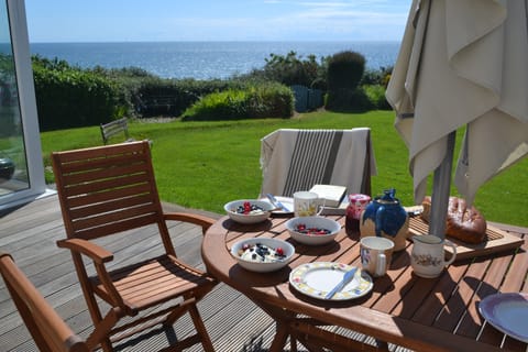Brunch on the patio overlooking the sea