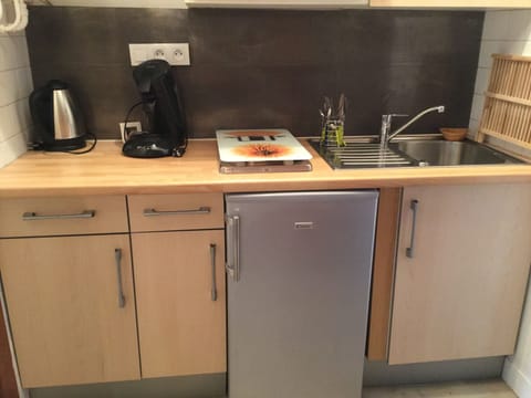 Fridge, microwave, stovetop, coffee/tea maker