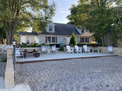 New 35'x14' cement patio, eco-friendly 8-person table, fire pit, lots of space.