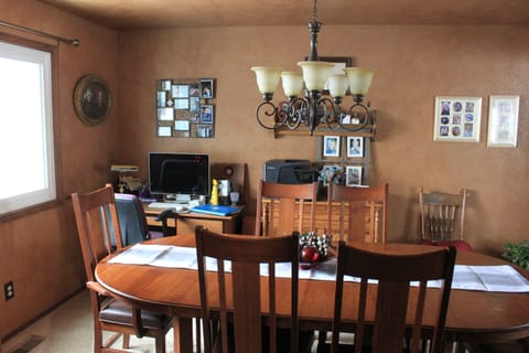 Dining room with computer monitor and printer and small work area