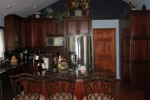 Kitchen with everything you need. Double oven and island that seats three.