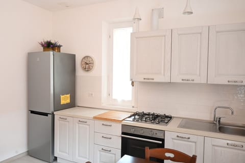 Fridge, oven, dining tables