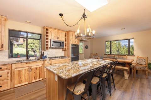 Wood hickory cabinets, double oven, large single basin stainless steel sink
