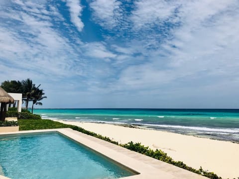 On the beach, sun loungers, beach towels