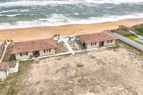 Aerial View of the Quarter Deck in Painter' Hill neighborhood of Flagler Beach, Florida (This listing is for the cottage on the left)