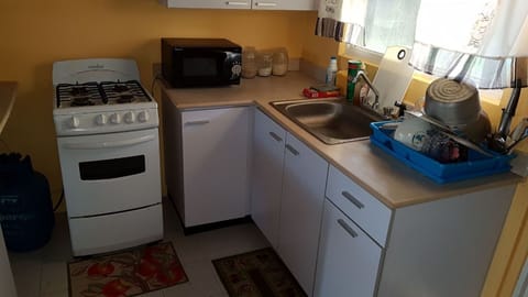 Microwave, coffee/tea maker, cookware/dishes/utensils