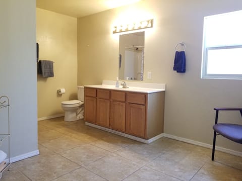 Combined shower/tub, hair dryer, towels, soap