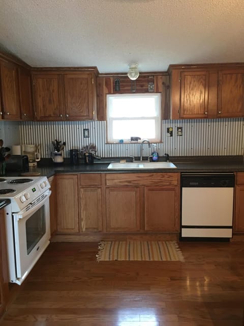 Kitchen has full size frig, oven/stove and dishwasher 