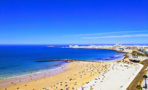 On the beach, sun loungers