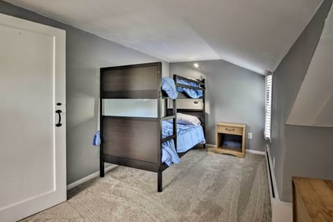 The kids will enjoy this room with a twin bunk bed.
