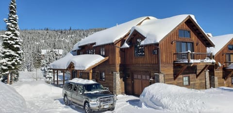 Ski in, right to the garage door! Parking for 4 cars.
