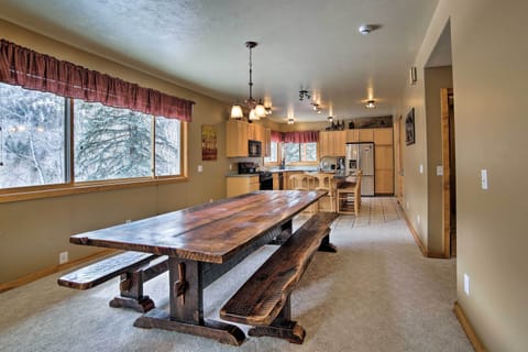 main level kitchen area, table fits a large group.