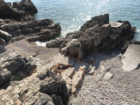 On the beach, sun loungers