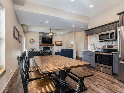 Lower level living area includes a spacious table for games