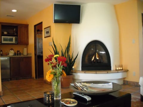 Gas fireplace adds a cozy, romantic charm.