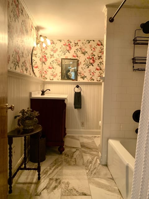 Combined shower/tub, hair dryer, towels, soap