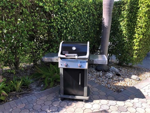 Throw some shrimp skewers onto the grill.