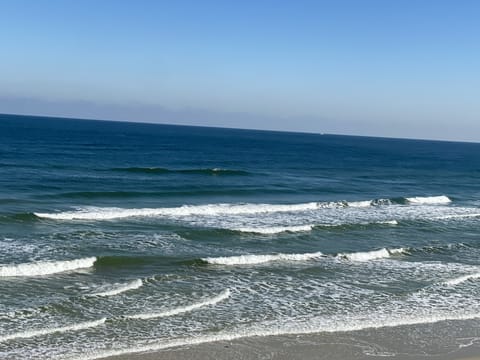 On the beach, sun loungers, beach towels