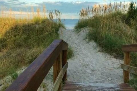 Beach nearby, sun loungers