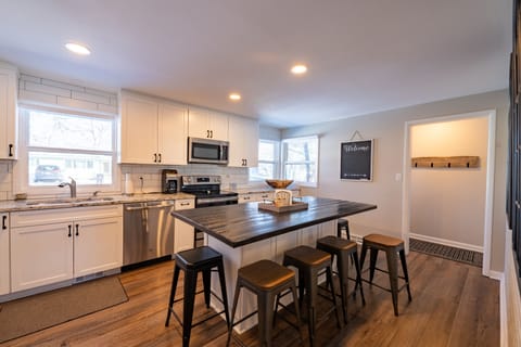 Reclaimed Amish barnwood island that seats 6