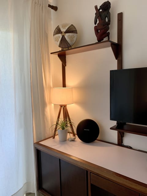 Smart TV and Bluetooth speaker in master bedroom