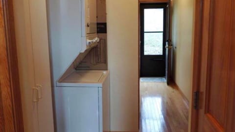 First floor easy access to stackable washer and dryer for guests