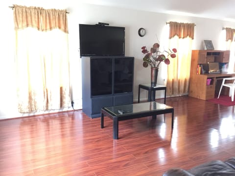 Spacious Living Room with Free Roku TV