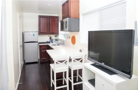 Full kitchen with 2 burner stove top and microwave oven (no full oven/stove top)