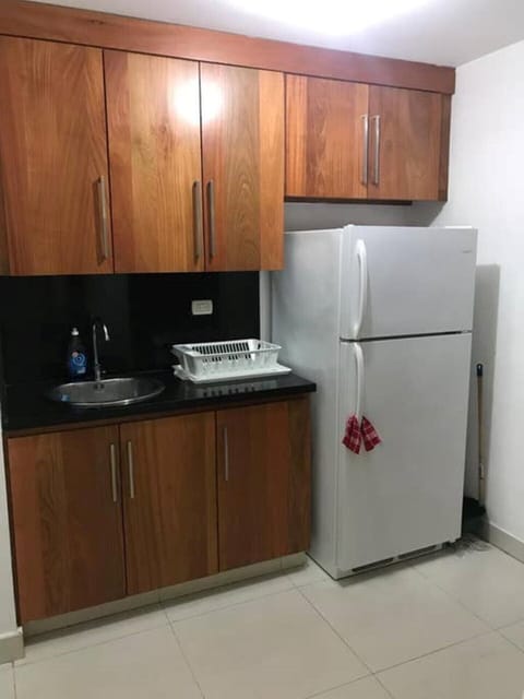 Microwave, dishwasher, coffee/tea maker, cookware/dishes/utensils