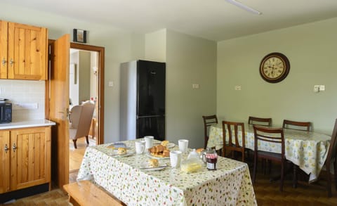 original handmade kitchen with dining tables to seat up to ten people