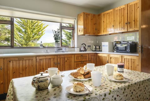 original handmade kitchen with dining tables to seat up to ten people